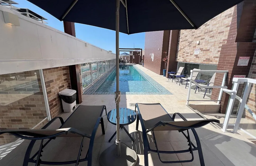 #208.Apto novo, 300 metros da praia, com piscina-1